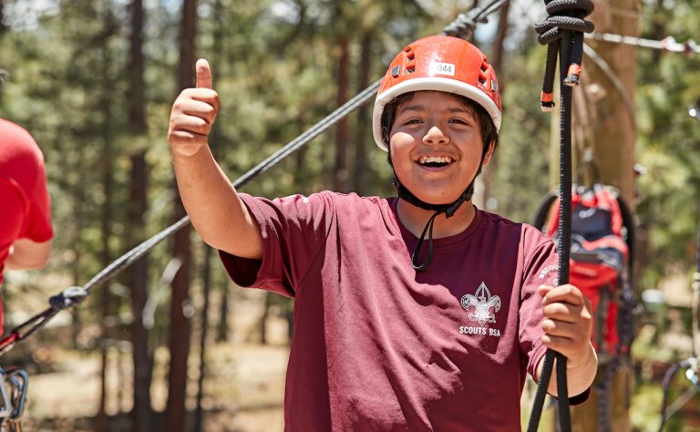 Participating in rope course activities